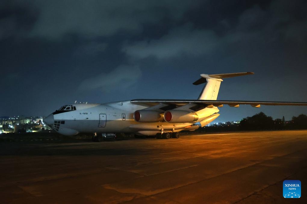 This photo taken on Dec. 6, 2023 shows a plane loaded with humanitarian goods prepared for the Gaza Strip at the Marka Military Airport in Amman, Jordan. The plane will arrive at Al Arish Airport near the Rafah border crossing between Egypt and the Gaza Strip.(Photo: Xinhua)