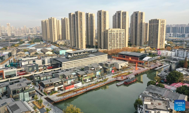 This aerial photo taken on Dec. 9, 2023 shows a view of a commercial area converted from an abandoned steel plant near the Grand Canal in Wuxi, east China's Jiangsu Province. (Photo: Xinhua)
