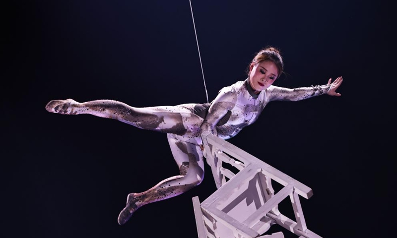 A Chinese acrobat performs during the fabulous night at Cirque Phoenix in Paris, France, Dec. 8, 2023. Acrobats from Dalian Cirque of China performed here on Friday night. (Photo: Xinhua)