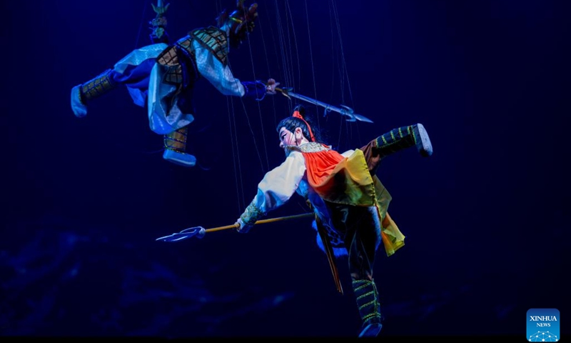 Puppet figures are pictured during a performance at the opening of the 7th China Quanzhou International Puppet Festival in Quanzhou, southeast China's Fujian Province, Dec. 9, 2023. The puppet festival opened here on Saturday as part of the fifth Maritime Silk Road International Arts Festival. Artists from 35 puppet show teams will put on more than 80 performances over the next four days. (Photo: Xinhua)