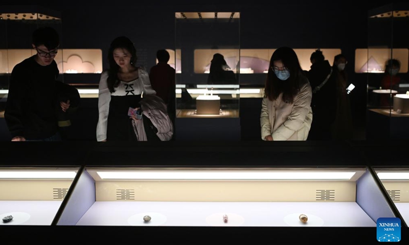 Visitors view snuff bottles displayed at Ningxia Museum in Yinchuan, northwest China's Ningxia Hui Autonomous Region, Dec. 10, 2023. The exhibition features 26 snuff bottles from Ningxia Museum and 236 snuff bottles from Chongqing China Three Gorges Museum in southwest China's Chongqing. (Photo: Xinhua)