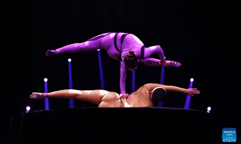 Chinese acrobats perform during the fabulous night at Cirque Phoenix in Paris, France, Dec. 8, 2023. Acrobats from Dalian Cirque of China performed here on Friday night. (Photo: Xinhua)