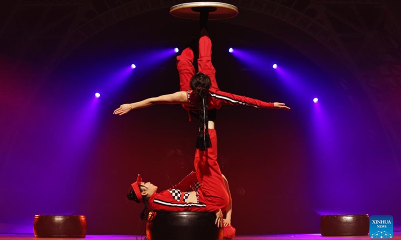 Chinese acrobats perform during the fabulous night at Cirque Phoenix in Paris, France, Dec. 8, 2023. Acrobats from Dalian Cirque of China performed here on Friday night. (Photo: Xinhua)