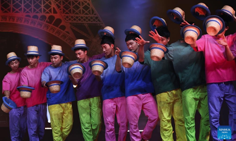 Chinese acrobats perform during the fabulous night at Cirque Phoenix in Paris, France, Dec. 8, 2023. Acrobats from Dalian Cirque of China performed here on Friday night. (Photo: Xinhua)