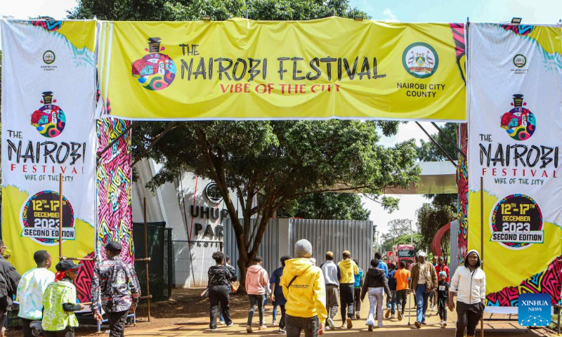 People walk in Uhuru Park in Nairobi, capital of Kenya, on Dec. 16, 2023. (Photo by Joy Nabukewa/Xinhua)