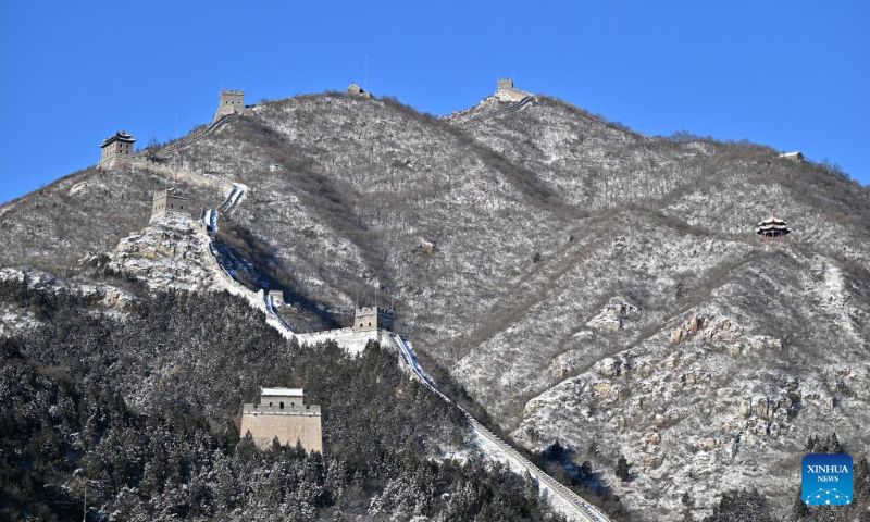 This photo taken on Dec. 16, 2023 shows the snow scenery at the Juyongguan section of the Great Wall in Beijing, capital of China. (Xinhua/Chen Yehua)