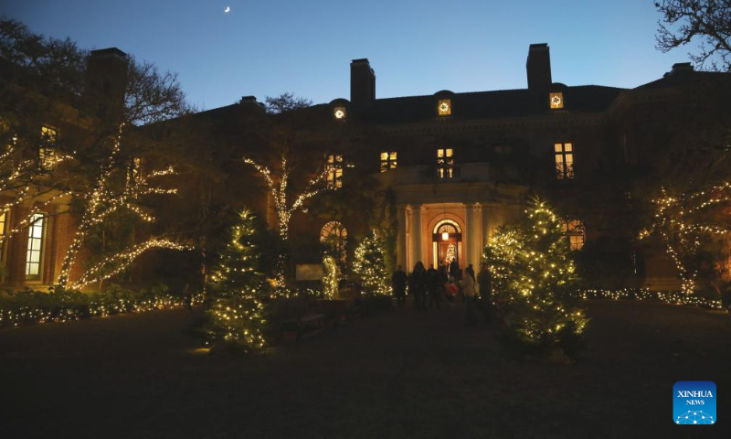 People visit the Filoli Historic House & Garden in Woodside, California, the United States, Dec. 16, 2023. (Photo by Liu Yilin/Xinhua)