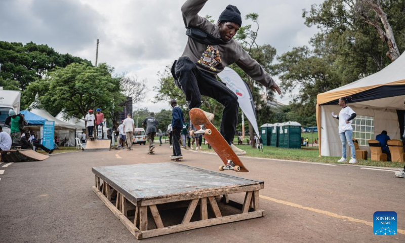 A citizen practices skateboard at Uhuru Park in Nairobi, capital of Kenya, on Dec. 16, 2023. (Xinhua/Wang Guansen)