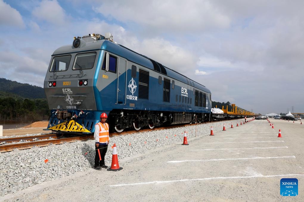 This photo shows the construction site of the East Coast Rail Link in Kuantan, Malaysia on Dec. 11, 2023. The East Coast Rail Link (ECRL), a mega rail project in Malaysia being built by the China Communications Construction Company (CCCC) has seen its first tracks being laid on Monday. Malaysian King Sultan Abdullah Sultan Ahmad Shah is among the guests to witness the historic moment in a ceremony here.(Photo: Xinhua)