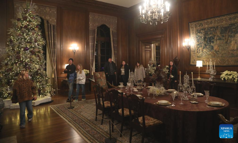People visit the Filoli Historic House & Garden in Woodside, California, the United States, Dec. 16, 2023. (Photo by Liu Yilin/Xinhua)