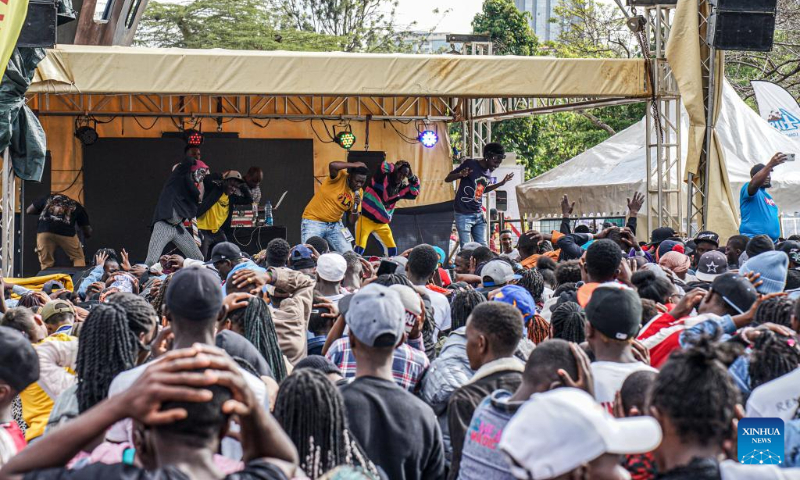 People enjoy a live music show at Uhuru Park in Nairobi, capital of Kenya, on Dec. 16, 2023. (Xinhua/Li Yahui)