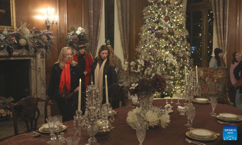 People visit the Filoli Historic House & Garden in Woodside, California, the United States, Dec. 16, 2023. (Photo by Liu Yilin/Xinhua)
