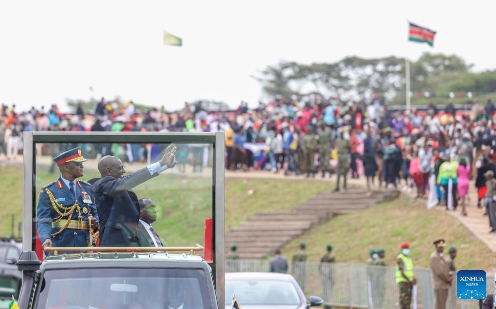 Kenyan President William Ruto waves to people during celebrations to mark the 60th anniversary of Kenya's independence at Uhuru Gardens in Nairobi, Kenya, on Dec. 12, 2023. Kenya's Jamhuri Day or Independence Day, observed on Dec. 12 each year, is one of the most important national holidays in Kenya. Kenya obtained its independence from the United Kingdom on Dec. 12, 1963.(Photo: Xinhua)