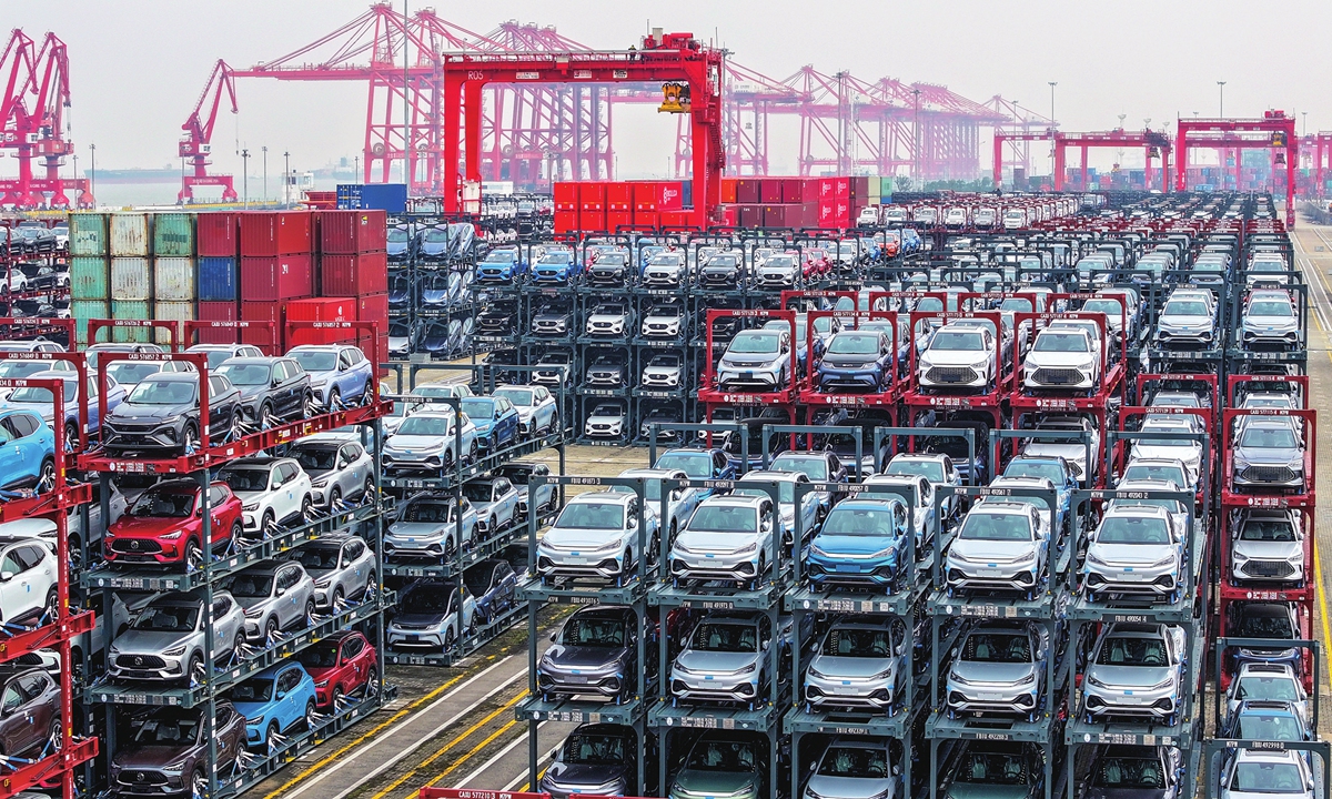 New-energy vehicles (NEVs) are ready to be exported at a container terminal in Taicang Port, East China's Jiangsu Province on December 13, 2023. In the first 11 months of this year, the port exported 159,800 NEVs, an increase of 1.84 times year-on-year. Photo: VCG