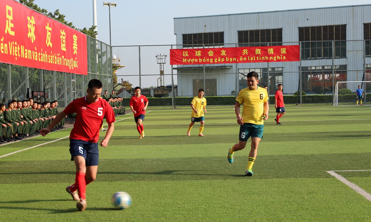 Police officers from China Coast Guard (CCG) and Vietnam Coast Guard participate in a friendly soccer match on December 5, 2023. Photo: Courtesy of CCG