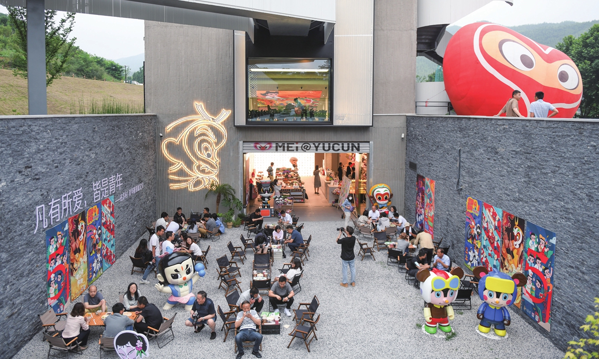 A China-chic animation-themed space created by young people in Yucun village in Anji, East China's Zhejiang Province, attracts visitors to take photos on June 5, 2023. Photo: VCG