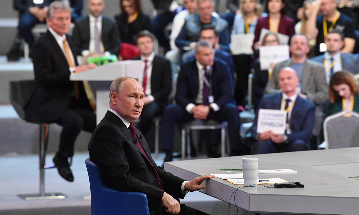 Russian President Vladimir Putin holds 
