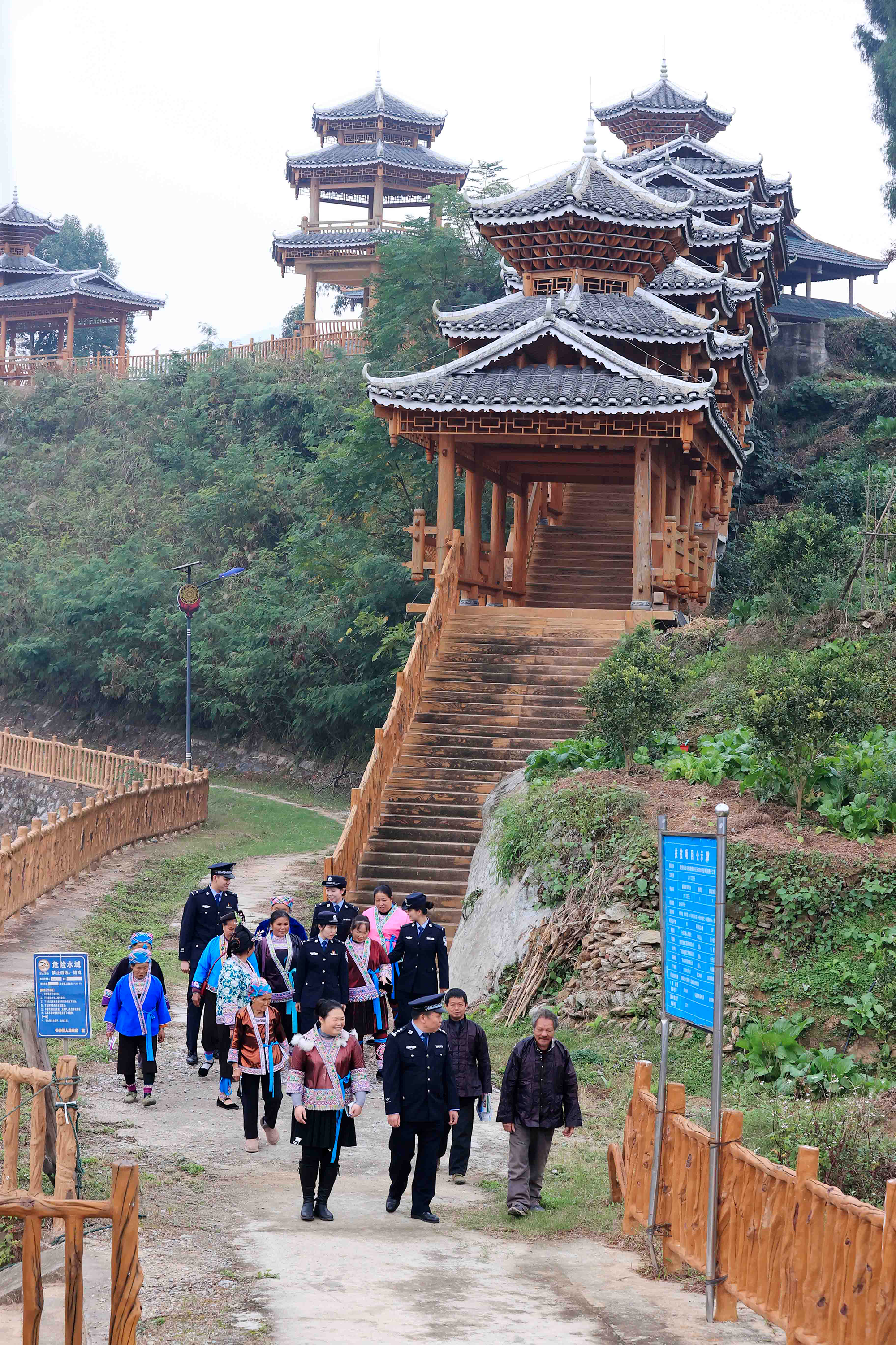 Police officers conduct an anti-drug education campaign for ethnic groups in a Miao village in Liuzhou, South China's Guangxi Zhuang Autonomous Region, on December 14, 2023. Given that the village has a high number of migrant workers and tourists, local residents are given tailored guidance to enhance awareness and prevent drug abuse. Photo: VCG