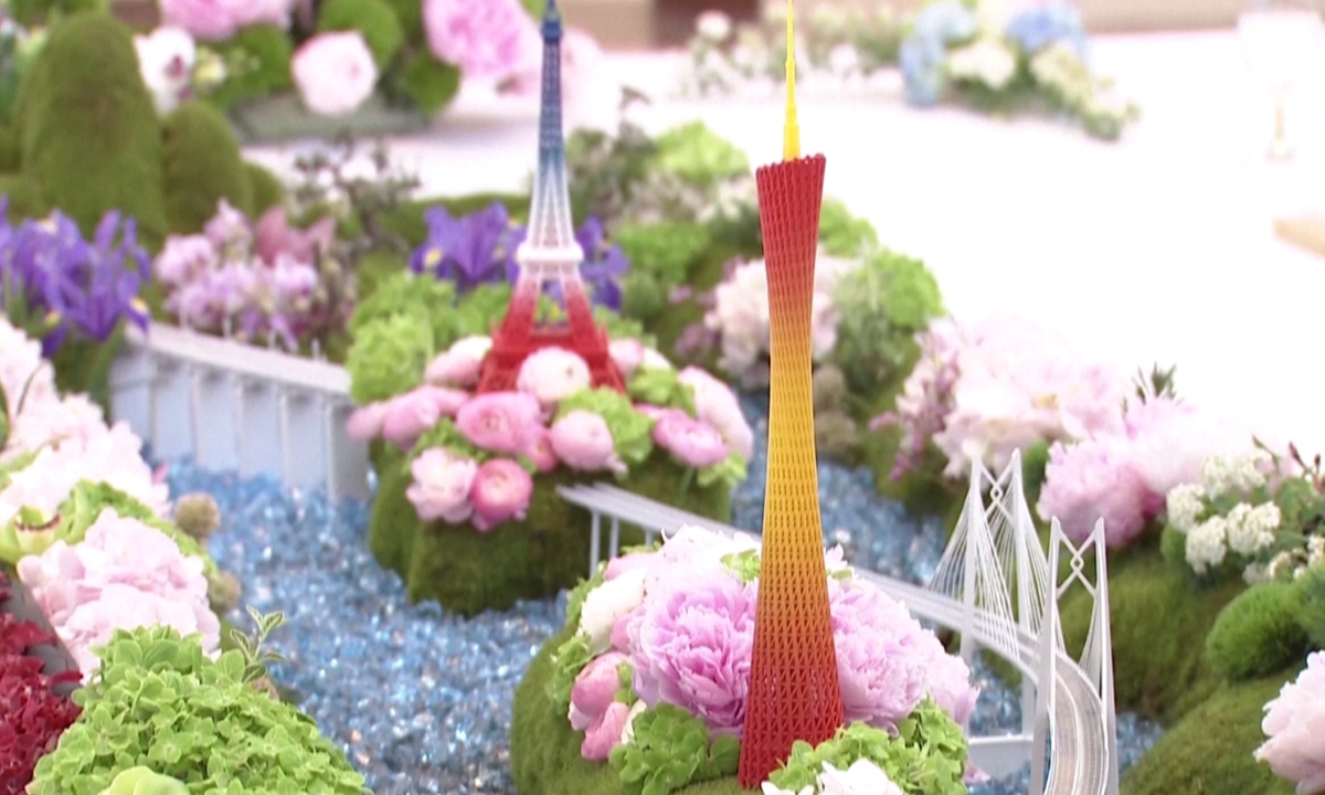 Food shaped like the Canton Tower, a landmark building in Guangzhou, Guangdong Province, and the Eiffel Tower of Paris on display at the dinner for French President Emmanuel Macron in Guangzhou, on April 7, 2023. Photo: VCG
