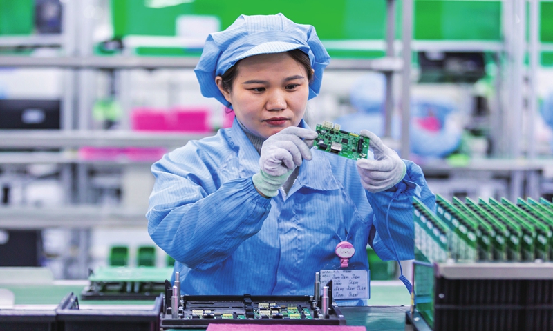 
A staff member manufactures parts for elevators on December 19, 2023 in Hai'an, East China's Jiangsu Province. The city has been strengthening policy support for local enterprises in funds, resources and other aspects in a bid to enhance companies' innovation capacity and better integrate them into the industry chain of the Yangtze River Delta region. Photo: cnsphoto