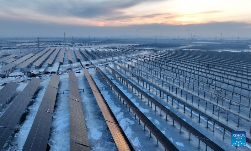 This aerial photo taken on Dec. 23, 2023 shows a solar power plant in Tangshan City, north China's Hebei Province. In recent years, Tangshan City in Hebei Province encouraged the development of clean energy and promoted the construction of wind and solar power plants. By far, the installed capacity of clean energy in Tangshan reached 3.242 million kilowatts. (Xinhua/Yang Shiyao)