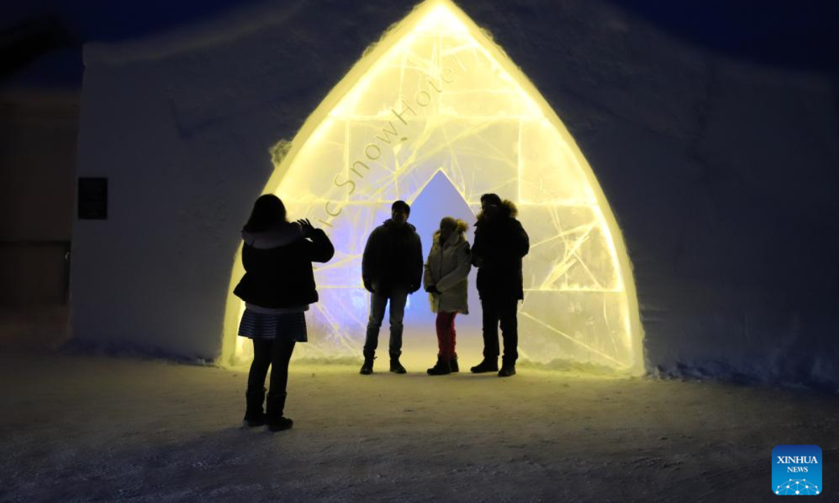 Tourists visit an ice hotel in Sinetta, Finland, Dec 28, 2023. An ice hotel with ice church, ice restaurant, ice bar and other facilities opened in Sinetta, attracting many tourists. Photo:Xinhua