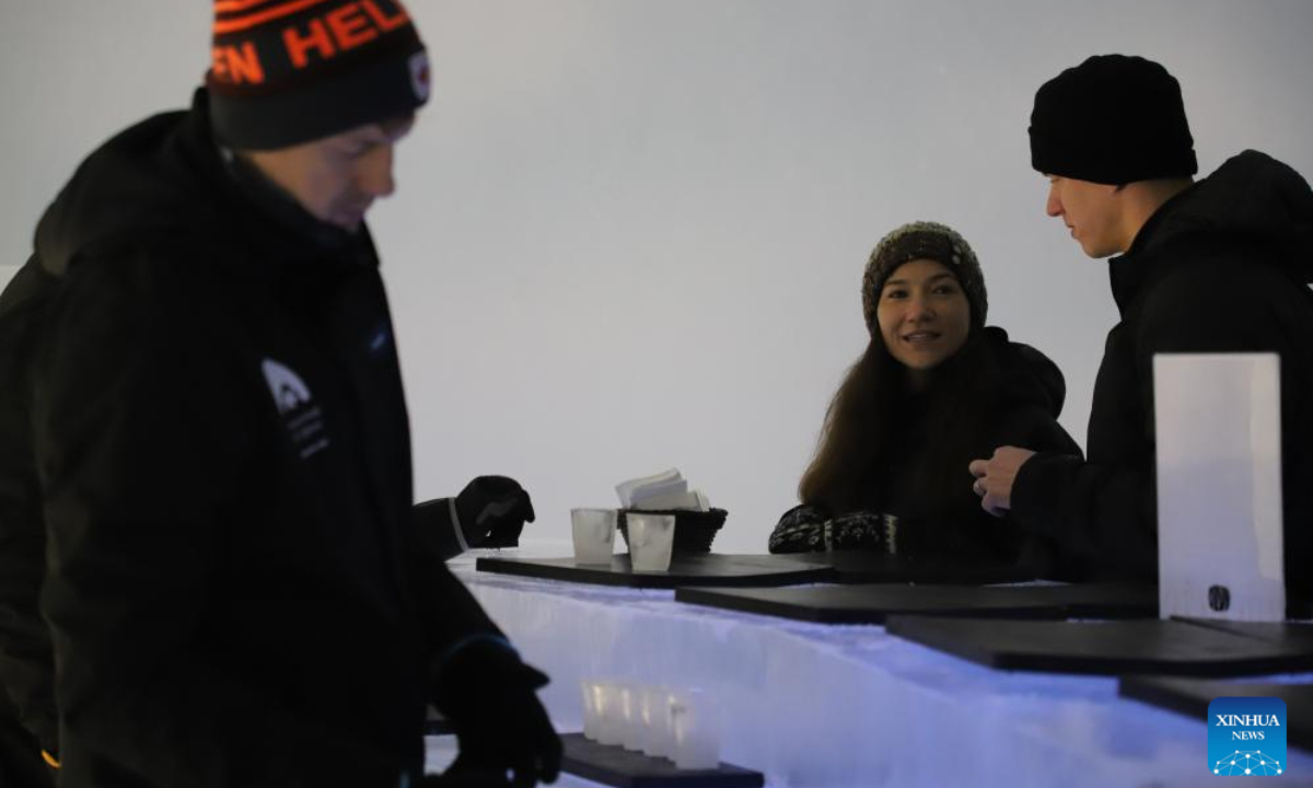 Tourists visit an ice hotel in Sinetta, Finland, Dec 28, 2023. An ice hotel with ice church, ice restaurant, ice bar and other facilities opened in Sinetta, attracting many tourists. Photo:Xinhua