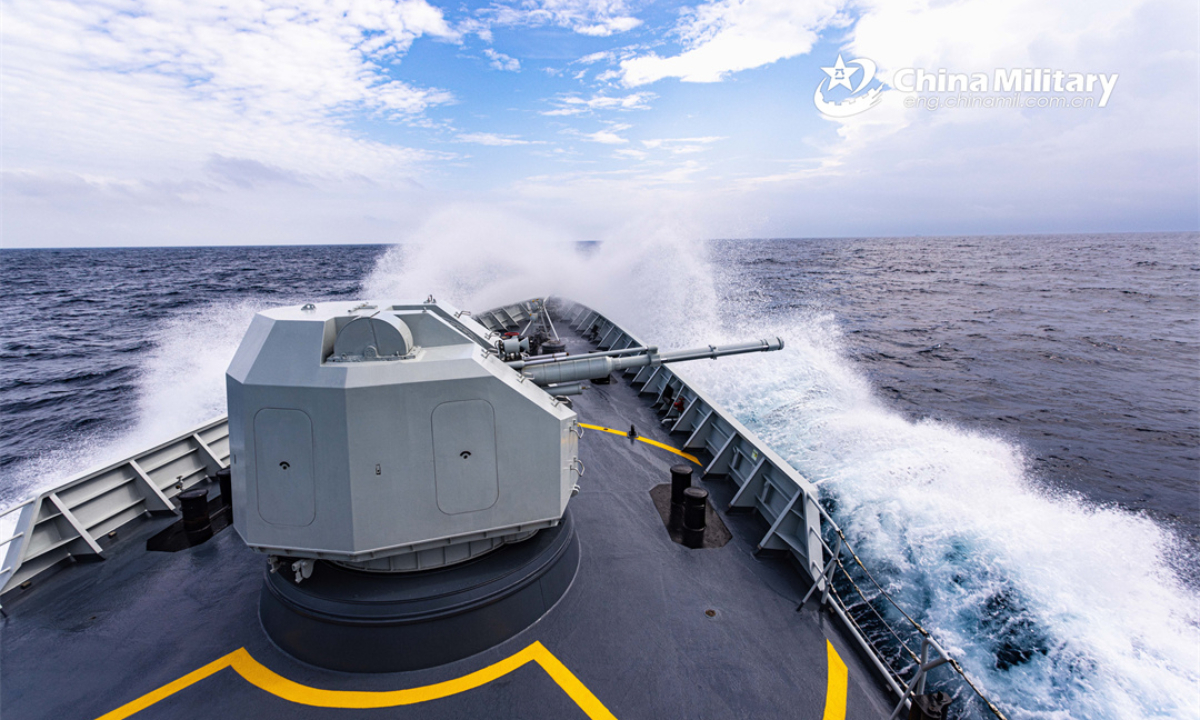 A guided-missile frigate attached to a destroyer flotilla with the navy under the PLA Southern Theater Command cleaves through the waves during a training exercise in recent days. Photo:China Military