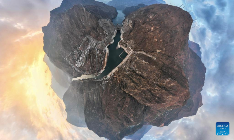 This aerial panoramic photo taken on Dec. 22, 2023 shows the Wudongde hydropower station on the border of Sichuan and Yunnan provinces in southwest China. Wudongde hydropower station is a major national project to implement China's west-to-east power transmission program. (Xinhua/Hu Chao)