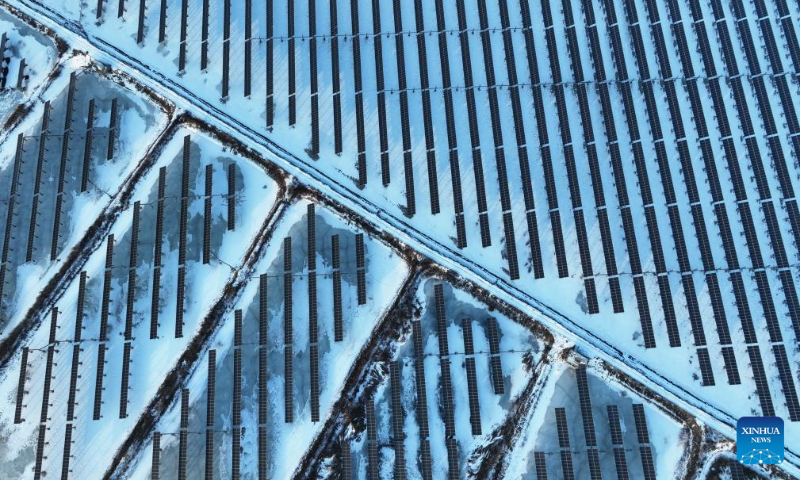 This aerial photo taken on Dec. 23, 2023 shows a solar power plant in Tangshan City, north China's Hebei Province. In recent years, Tangshan City in Hebei Province encouraged the development of clean energy and promoted the construction of wind and solar power plants. By far, the installed capacity of clean energy in Tangshan reached 3.242 million kilowatts. (Xinhua/Yang Shiyao)