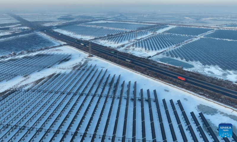 This aerial photo taken on Dec. 23, 2023 shows a solar power plant in Tangshan City, north China's Hebei Province. In recent years, Tangshan City in Hebei Province encouraged the development of clean energy and promoted the construction of wind and solar power plants. By far, the installed capacity of clean energy in Tangshan reached 3.242 million kilowatts. (Xinhua/Yang Shiyao)