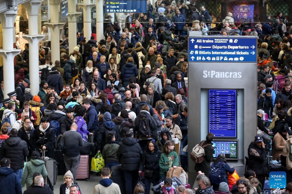 Passengers gather at St. Pancras International Station in London, Britain on Dec. 21, 2023. Unexpected strike action by Eurotunnel staff disrupted rail traffic on Thursday, preventing services from proceeding through the Channel Tunnel, the undersea link between Britain and continental Europe.(Photo: Xinhua)