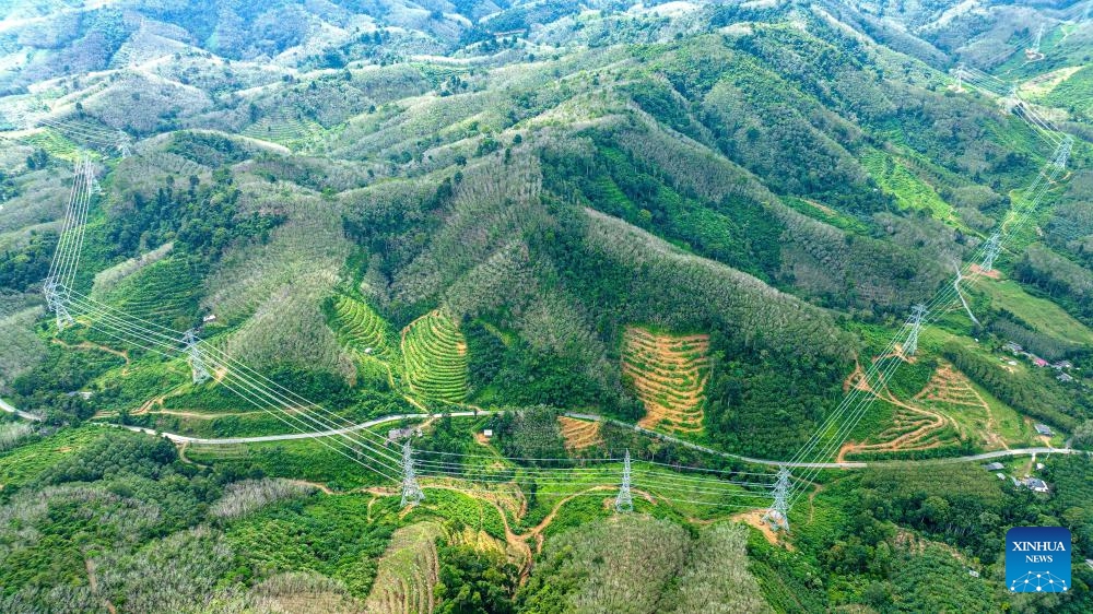 This aerial photo taken on Dec. 19, 2023 shows a view of the China-built Thung Song-Songkhla 500kV Transmission Line Project in Nakhon Si Thammarat, Thailand. A China-built power transmission line project was inaugurated on Tuesday in Thailand's southern Phatthalung province after two years of construction. The Thung Song-Songkhla 500kV Transmission Line Project, known as the Thung Song Project, is the first 500kV Transmission Line in southern Thailand.(Photo: Xinhua)