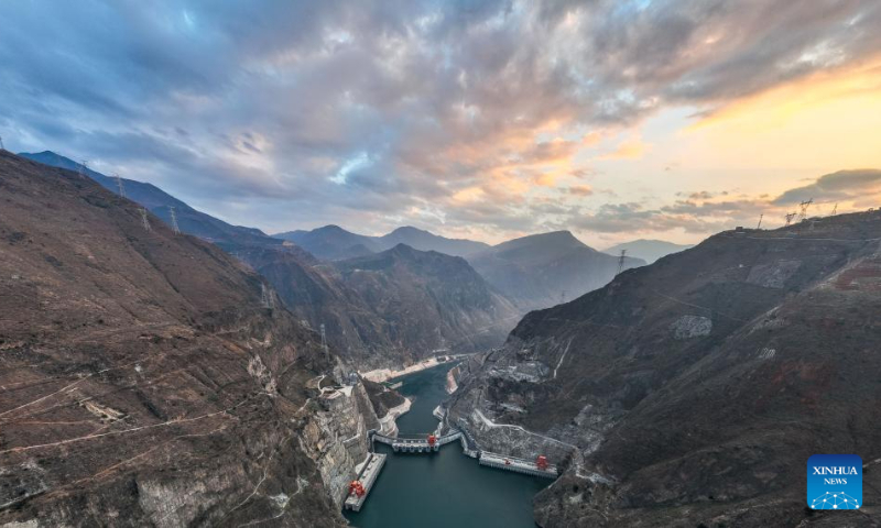 This aerial photo taken on Dec. 22, 2023 shows the Wudongde hydropower station on the border of Sichuan and Yunnan provinces in southwest China. Wudongde hydropower station is a major national project to implement China's west-to-east power transmission program. (Xinhua/Hu Chao)
