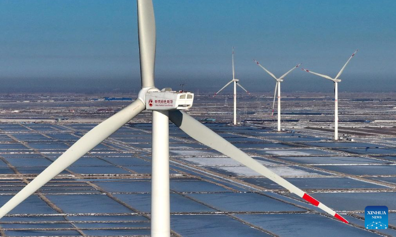 This aerial photo taken on Dec. 22, 2023 shows a wind farm in Tangshan City, north China's Hebei Province. In recent years, Tangshan City in Hebei Province encouraged the development of clean energy and promoted the construction of wind and solar power plants. By far, the installed capacity of clean energy in Tangshan reached 3.242 million kilowatts. (Xinhua/Yang Shiyao)