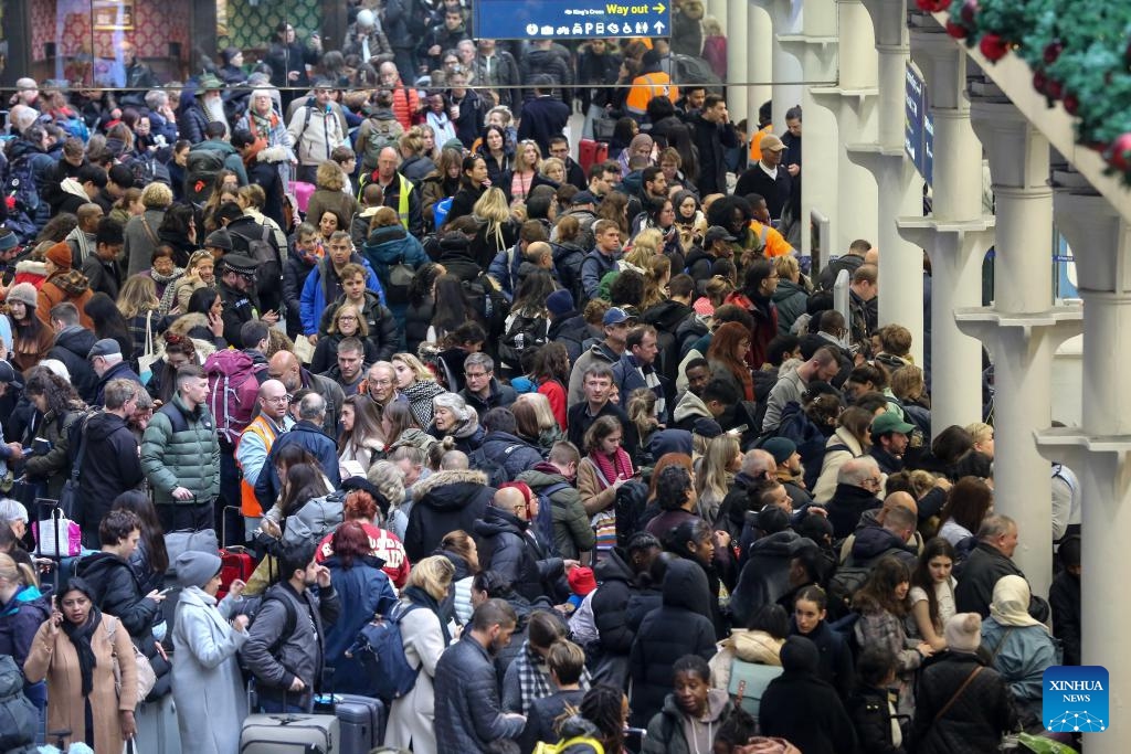 Passengers gather at St. Pancras International Station in London, Britain on Dec. 21, 2023. Unexpected strike action by Eurotunnel staff disrupted rail traffic on Thursday, preventing services from proceeding through the Channel Tunnel, the undersea link between Britain and continental Europe.(Photo: Xinhua)