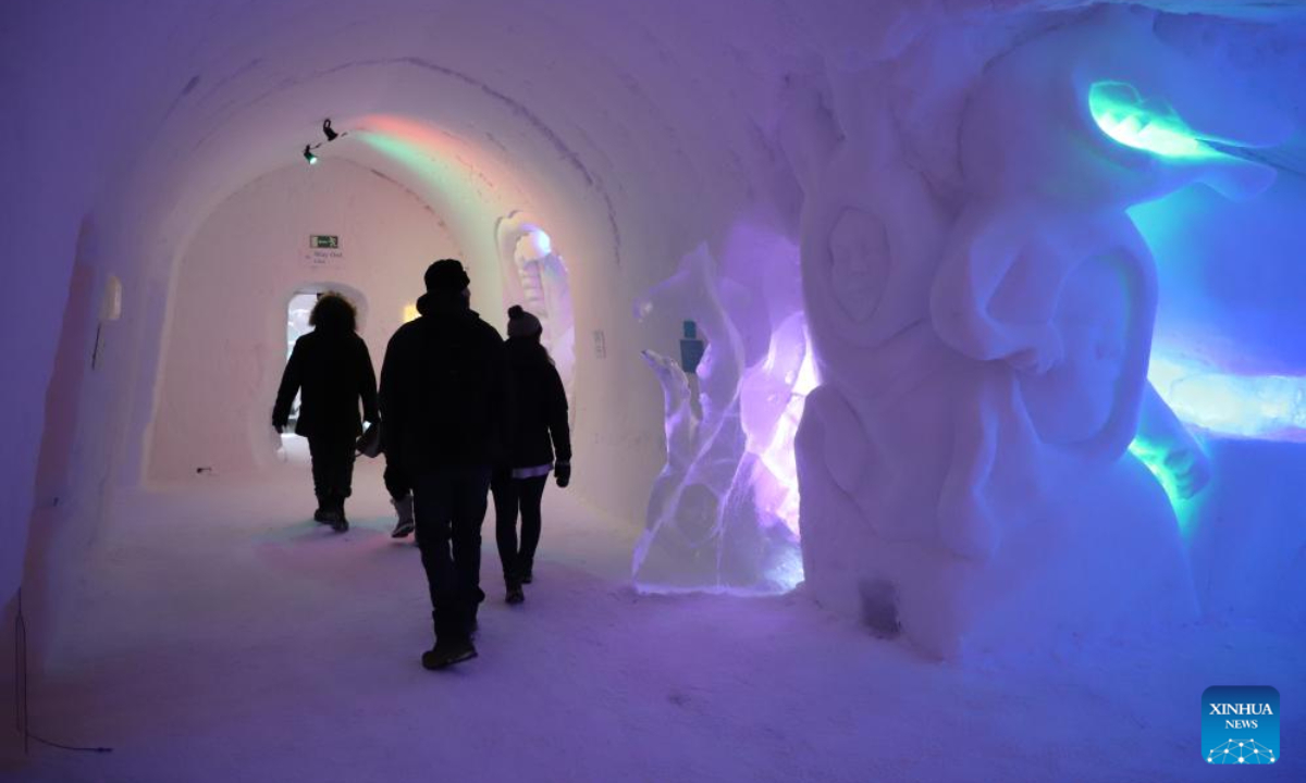 Tourists visit an ice hotel in Sinetta, Finland, Dec 28, 2023. An ice hotel with ice church, ice restaurant, ice bar and other facilities opened in Sinetta, attracting many tourists. Photo:Xinhua