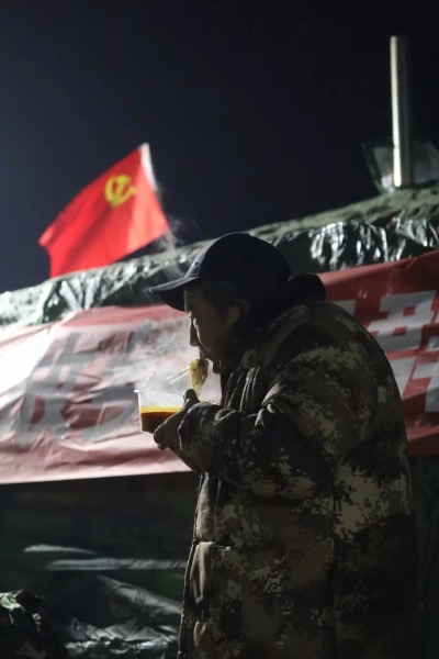 A villager enjoys a bowl of beef noodles on December 20, 2023. Photo: People's Daily