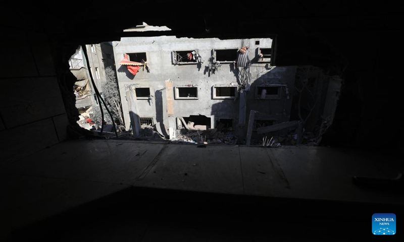 This photo taken on Dec. 24, 2023 shows the rubble after an Israeli airstrike in the southern Gaza Strip city of Rafah. At least 166 Palestinians were killed and 384 others were wounded during the past 24 hours by the ongoing Israeli attacks on the Gaza Strip, said the Gaza-based Health Ministry on Sunday. (Photo by Yasser Qudih/Xinhua)