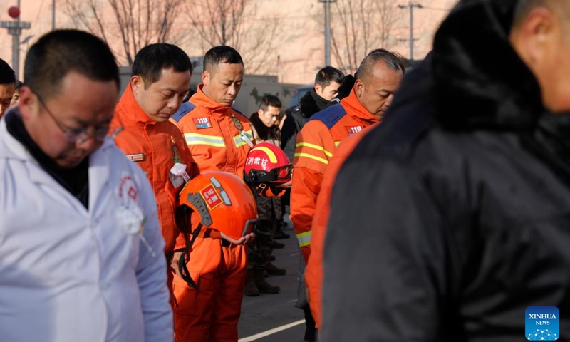 People pay a silent tribute during a commemorative event for earthquake victims at a square in Dahejia Township of Jishishan County, northwest China's Gansu Province, Dec. 25, 2023. A 6.2-magnitude earthquake jolted Jishishan County of Gansu Province on Dec. 18.(Photo: Xinhua)