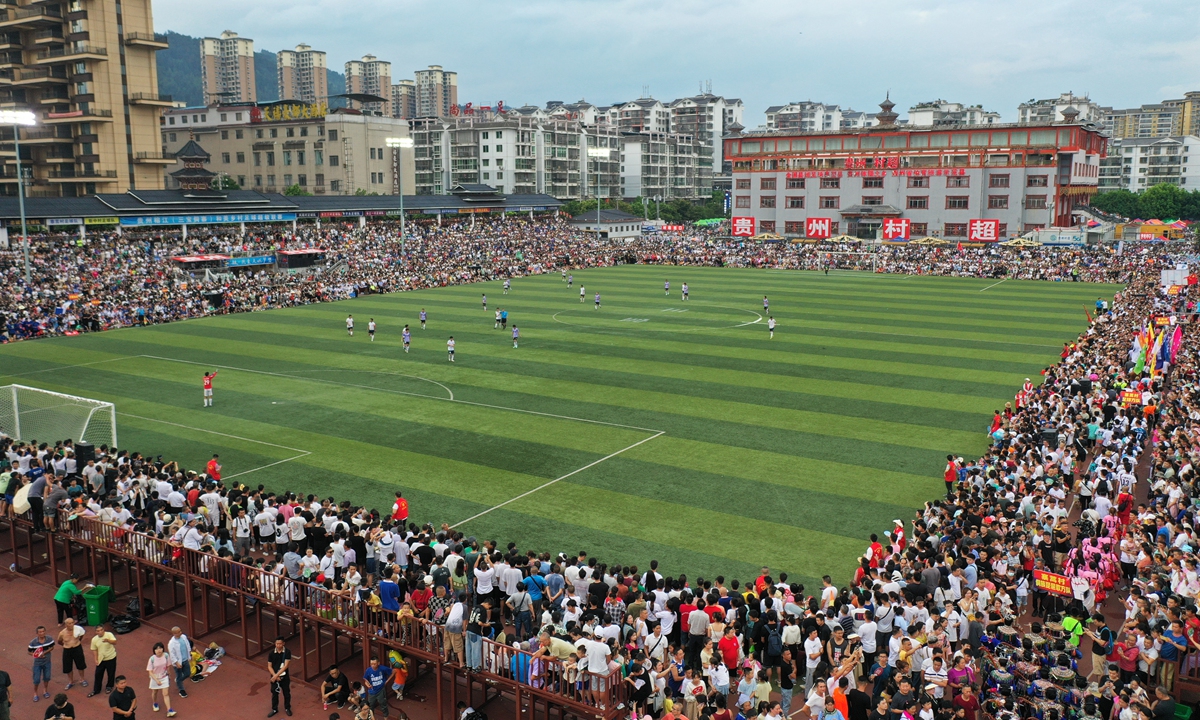 Fans watch a Village Super League match in Rongjiang county, Southwest China's Guizhou Province. Photo: VCG
