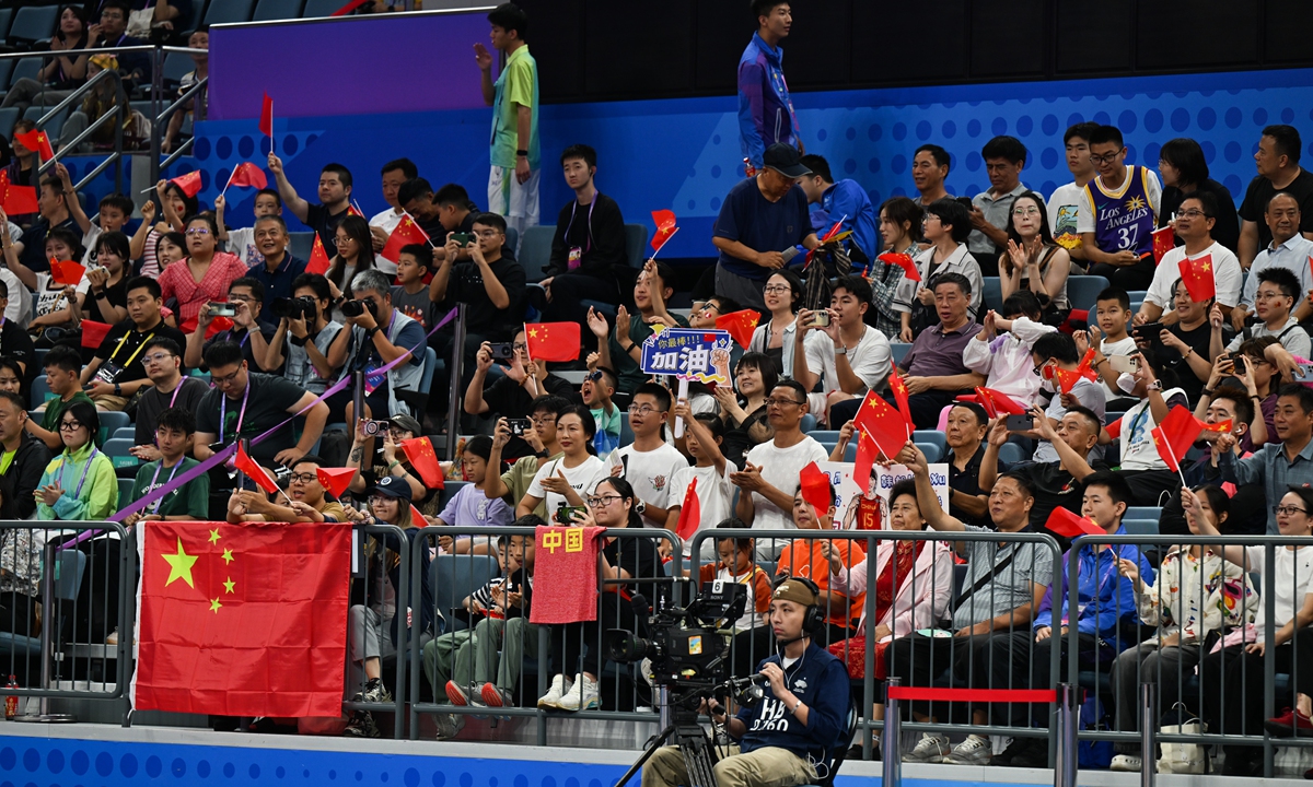 Spectators watch a match at the Hangzhou Asian Games. Photo: VCG