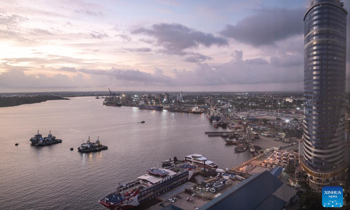 This photo taken on Dec. 29, 2023 shows the Dar es Salaam port at sunrise in Dar es Salaam, Tanzania. (Photo: Xinhua)