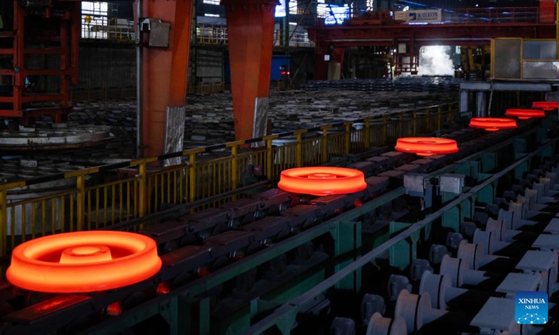 This photo taken on Dec. 15, 2023 shows a hot rolling production line in China Baowu Group Masteel Rail Transit Materials Technology Co., Ltd. (MRT) in Ma'anshan, east China's Anhui Province. (Photo: Xinhua)