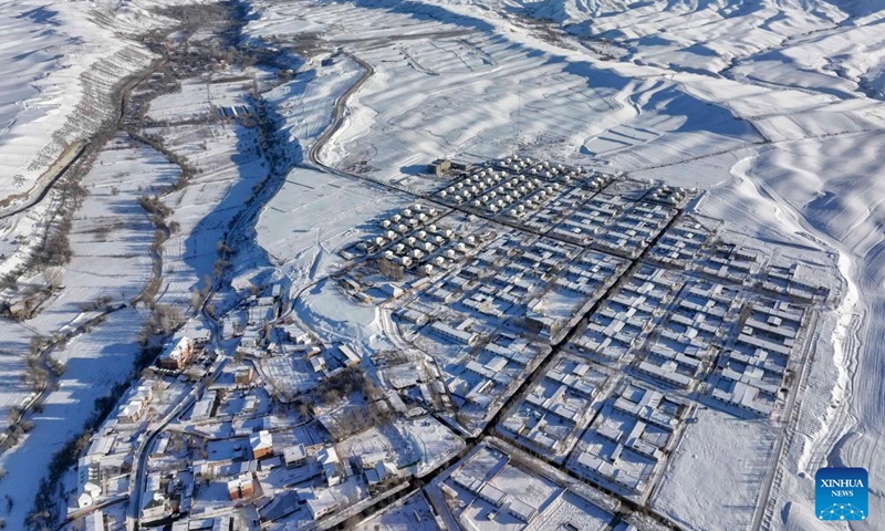 This aerial photo taken on Jan. 1, 2024 shows a view of Tianshan Village of Tiechanggou Town in Urumqi, northwest China's Xinjiang Uygur Autonomous Region. (Photo: Xinhua)
