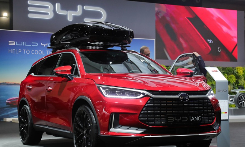 A man looks at a BYD Tang during the press day of the 100th Brussels Motor Show in Brussels, Belgium, Jan. 13, 2023.Photo:Xinhua