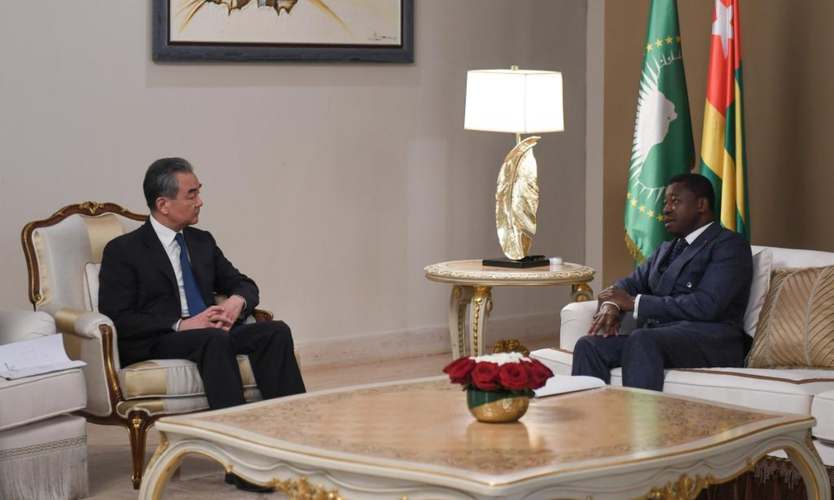 Chinese Foreign Minister Wang Yi (left), also a member of the Political Bureau of the Communist Party of China Central Committee, meets with Togolese President Faure Gnassingbe in Lomé, Togo, on January 17, 2024. Photo: Xinhua