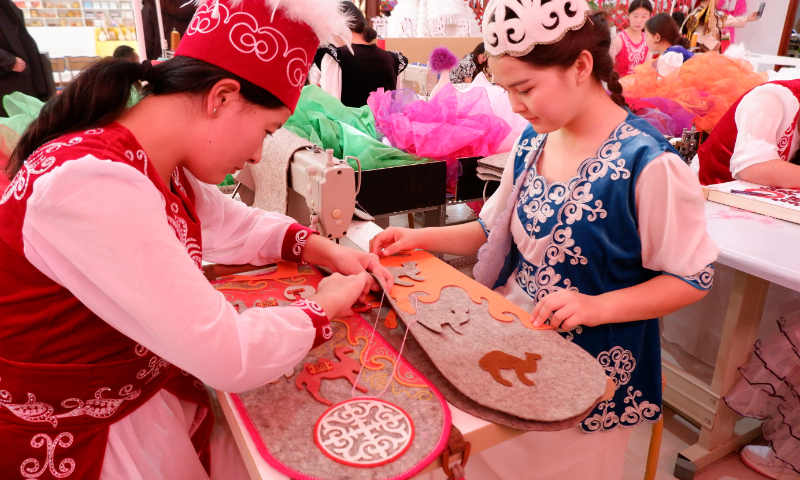 People in Xinjiang enjoy happy and colorful life. Photo: Xu Keyue/GT
