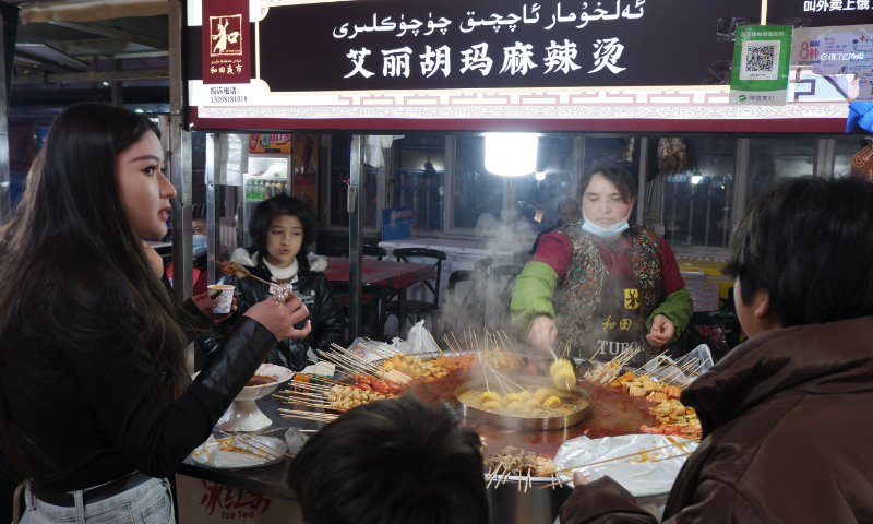 People in Xinjiang enjoy happy and colorful life. Photo: Xu Keyue/GT