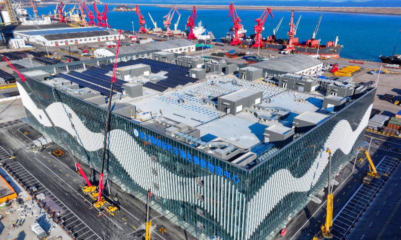 A photo taken on January 10, 2024 shows the construction site of an international green and intelligent logistics center for automobiles in Lianyungang, East China's Jiangsu Province. This will be a five-story warehouse with fully automated parking enabled by robots. The logistics center will be able to hold 5,200 vehicles at once, and it can serve about 180,000 vehicles a year. Photo: cnsphoto